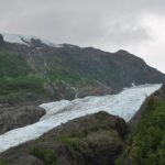 A view of the side of a mountain with a glacier.