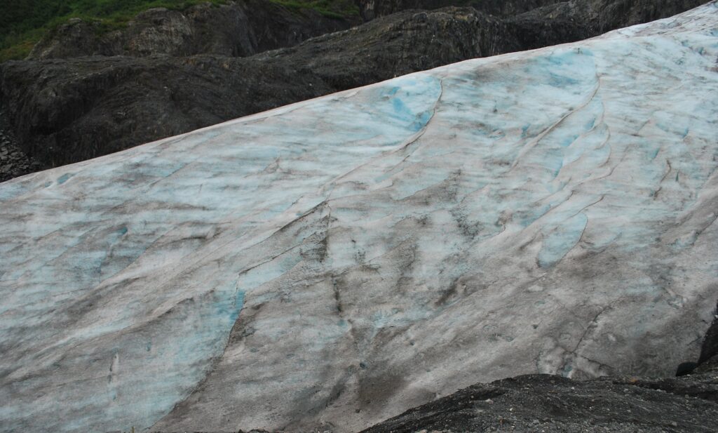 A close up of the side of a glacier