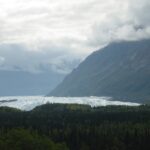 A view of the mountains and trees from above.