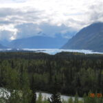 A view of the mountains and water from above.