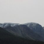 A mountain range with snow on top of it.