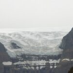 A view of the ocean from a mountain side.