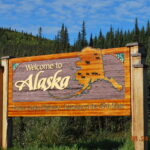 A sign that says welcome to alaska